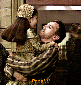 Man Holding Little Girl Saying Papa