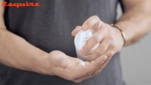 Man Holding Lotion Bottle Esquire