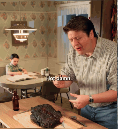 Man Holding Meat Saying Hot Damn