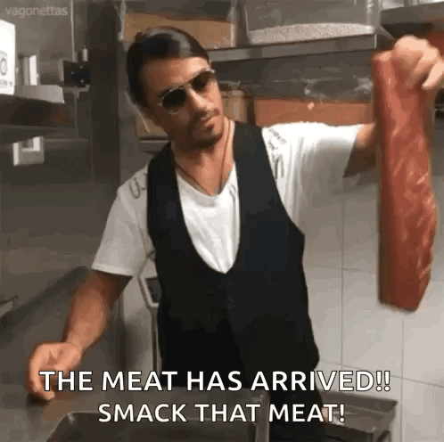 Man Holding Meat Saying Meat Has Arrived GIF