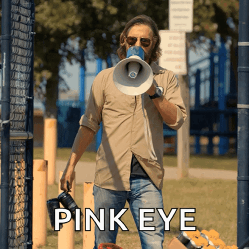 Man Holding Megaphone And Camera Saying Pink Eye GIF