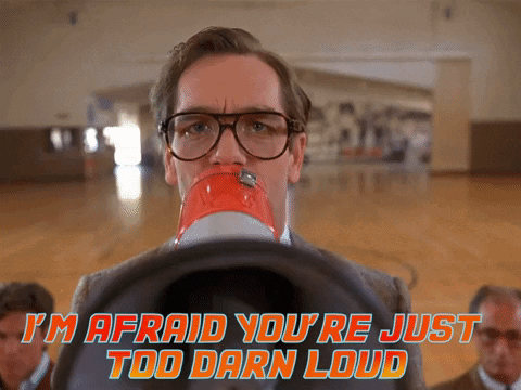Man Holding Megaphone Saying I'm Afraid You're Just Too Darn Loud