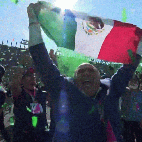 Man Holding Mexican Flag