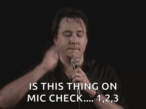 Man Holding Mic Saying Is This Thing On Mic Check GIF