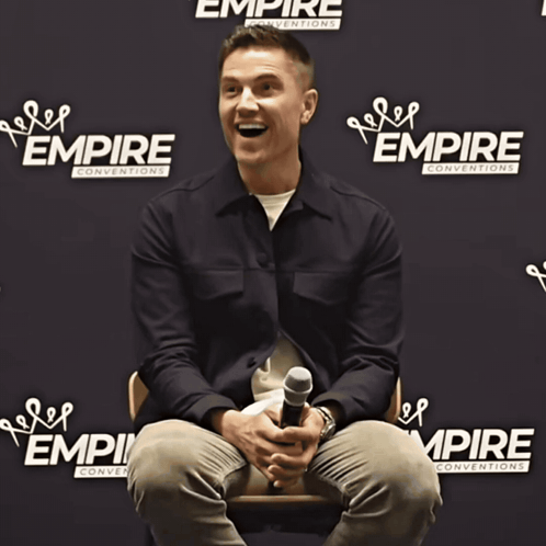 Man Holding Microphone at Empire Conventions