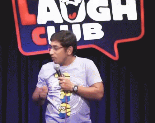 Man Holding Microphone in Laugh Club