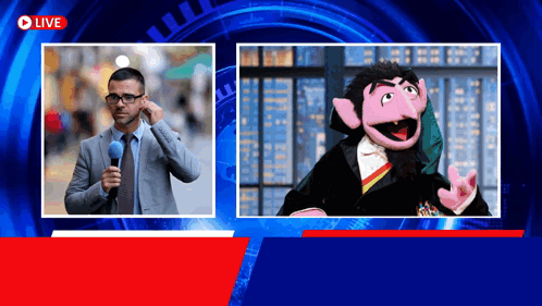 Man Holding Microphone Next to Sesame Street Puppet Picture