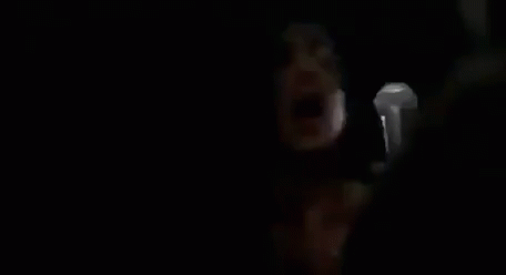 Man Holding Microphone Saying Adrianaa