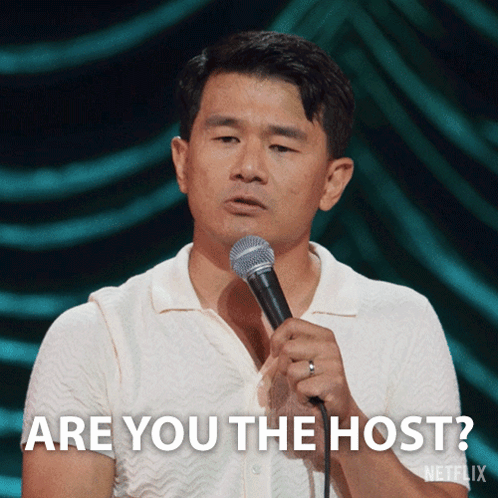 Man Holding Microphone Saying Are You The Host GIF