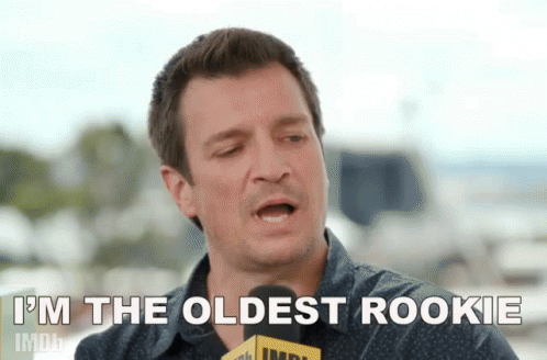 Man Holding Microphone Saying I'm The Oldest Rookie GIF
