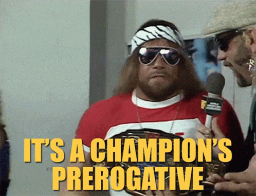 Man Holding Microphone Saying Its a Champions Prerogative