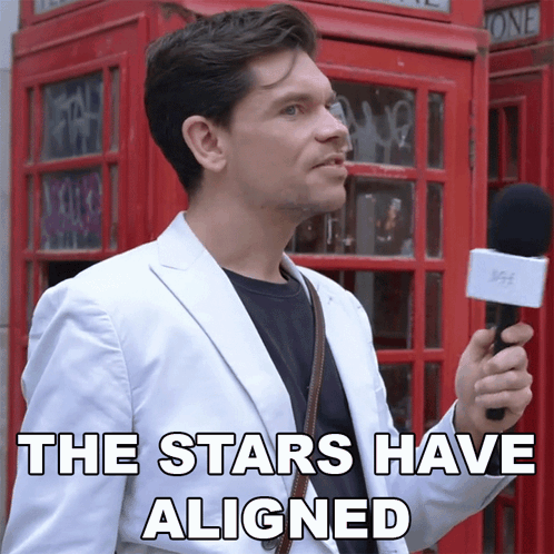 Man Holding Microphone Saying The Stars Have Aligned GIF