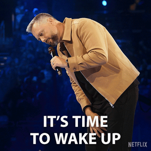 Man Holding Microphone Says It's Time To Wake Up GIF