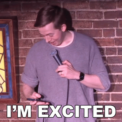 Man Holding Microphone With I'm Excited