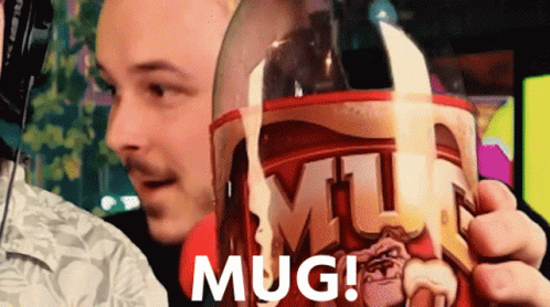 Man Holding Mug Saying Mug GIF