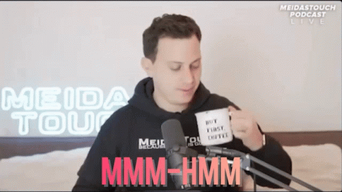 Man Holding Mug Saying Not First Coffee GIF