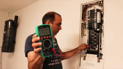 Man Holding Multimeter Saying 000