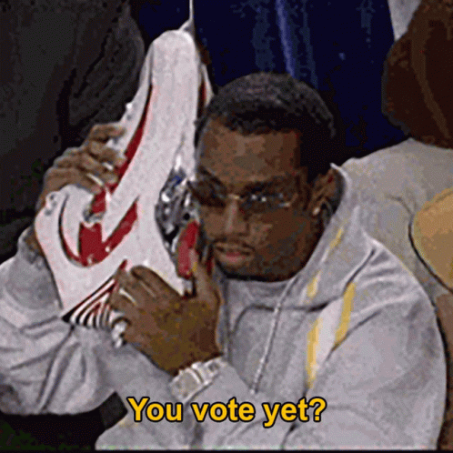 Man Holding Nike Shoes Saying You Vote Yet