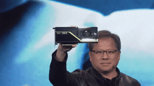 Man Holding Nvidia Graphics Card Blue Background
