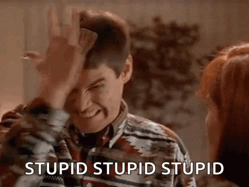 Man Holding Paper Making Funny Face GIF