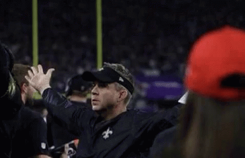 Man Holding Paper on Field