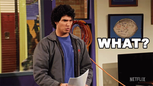 Man Holding Paper With What Sign GIF