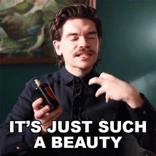 Man Holding Perfume Bottle Beauty