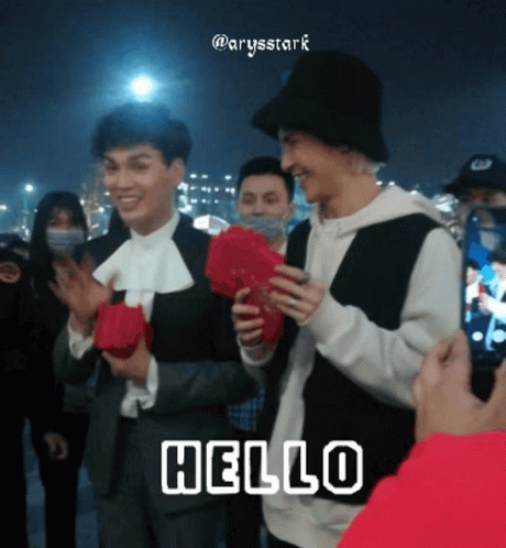 Man Holding Red Fan Saying Hello GIF