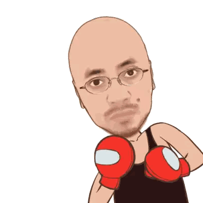 Man Holding Red Object with Boxing Gloves