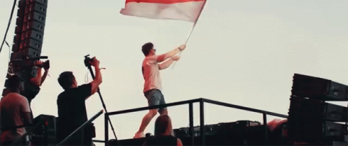 Man Holding Red White Blue Flag
