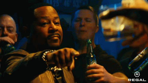 Man Holding Regal Beer Pointing
