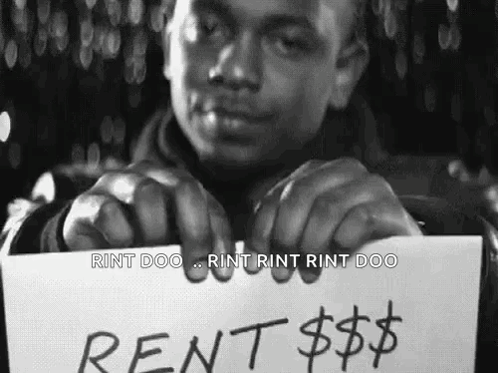 Man Holding Rent Sign GIF