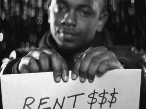Man Holding Rent Sign GIF