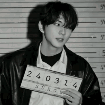Man Holding Sign 240314 GIF