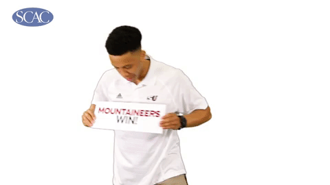 Man Holding Sign Mountaineers Win GIF
