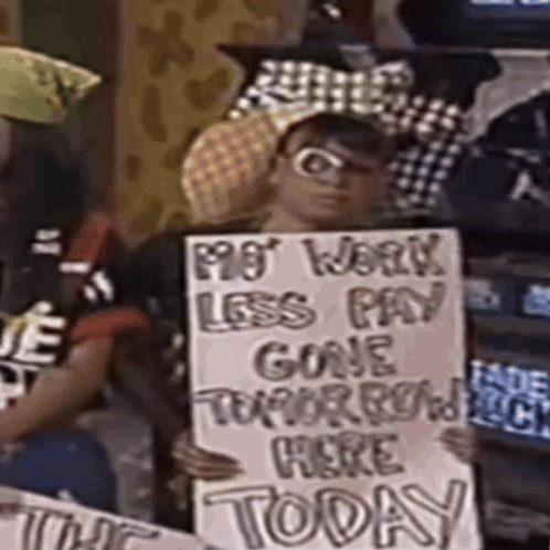 Man Holding Sign My Work Less Pay Gone Tomorrow Here Today GIF