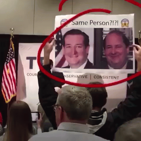 Man Holding Sign Saying Same Person