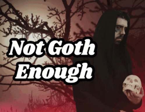 Man Holding Skull Not Goth Enough