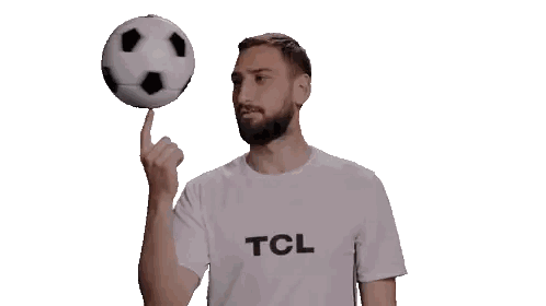 Man Holding Soccer Ball With Finger