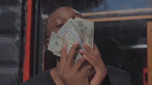 Man Holding Stack Of 20 Dollar Bills GIF