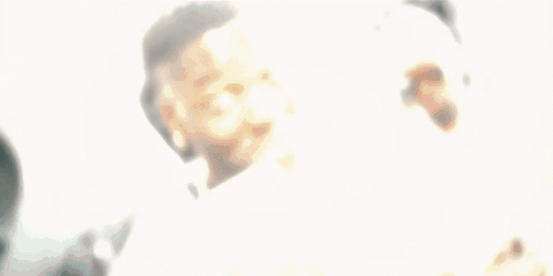 Man Holding Stack Of Money With Number 100 GIF