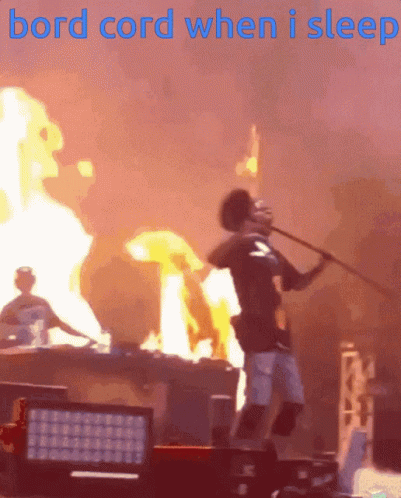 Man Holding Stick by Fire Bord Cord When I Sleep