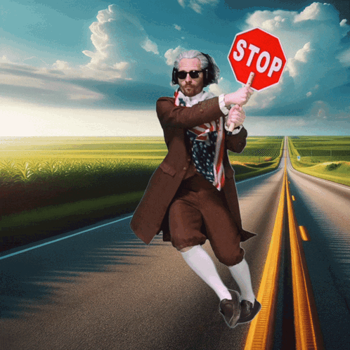 Man Holding Stop Sign