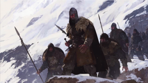 Man Holding Sword and Spear in Snow