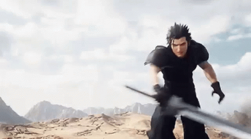 Man Holding Sword in Desert