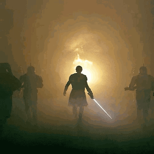 Man Holding Sword in Front of Bright Light