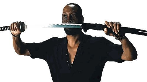 Man Holding Sword in Front of Face
