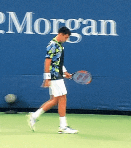 Man Holding Tennis Racquet GIF