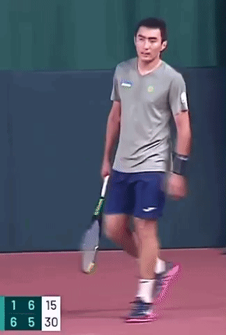 Man Holding Tennis Racquet Court Score 16-15-6-5-30