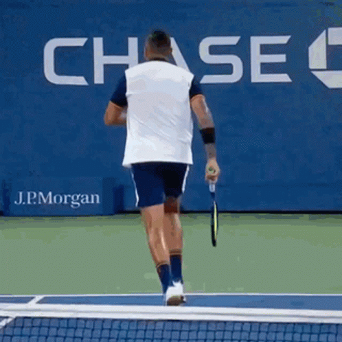 Man Holding Tennis Racquet GIF